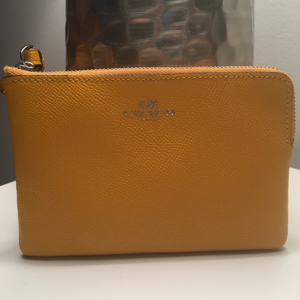 Coach mustard wristlet